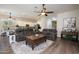 Open-concept living space with seamless transition to the kitchen and dining area at 31311 N 138Th Ave, Peoria, AZ 85383