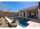Sparkling pool and patio area perfect for outdoor entertaining at 31311 N 138Th Ave, Peoria, AZ 85383