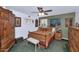 Cozy bedroom showcasing a traditional bed, wooden furniture, and decorative wall art at 3351 N 6Th Ave, Phoenix, AZ 85013