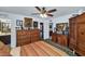 Inviting bedroom with antique wooden furnishings, unique decor, and a view of the bathroom at 3351 N 6Th Ave, Phoenix, AZ 85013