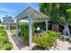 Relaxing covered patio with cozy seating, lush greenery, and serene garden views at 3351 N 6Th Ave, Phoenix, AZ 85013