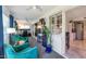 Sunroom with velvet furniture, sliding glass doors, and access to the kitchen at 3351 N 6Th Ave, Phoenix, AZ 85013