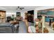 Open living and dining area with adjacent kitchen, classic decor, and comfortable seating at 3351 N 6Th Ave, Phoenix, AZ 85013