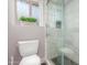 Updated bathroom boasts tile floors, a glass-enclosed shower, and a window above the toilet at 3500 N Hayden Rd # 801, Scottsdale, AZ 85251