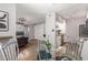 Open floor plan with a dining area connected to the kitchen and living room for easy entertaining at 3500 N Hayden Rd # 801, Scottsdale, AZ 85251