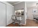 Open kitchen bar featuring seating, stainless appliances, and modern white cabinetry at 3500 N Hayden Rd # 801, Scottsdale, AZ 85251
