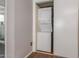 Laundry area with closet that contains a stacked washer and dryer at 3500 N Hayden Rd # 801, Scottsdale, AZ 85251
