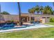 Inviting water feature at community entrance with lush landscaping adding a serene touch to the property at 3500 N Hayden Rd # 801, Scottsdale, AZ 85251