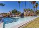 Scenic view of community water feature bordered by lush lawns and palm trees adding to a peaceful setting at 3500 N Hayden Rd # 801, Scottsdale, AZ 85251