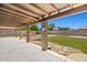 Spacious backyard with an open patio area, green grass, and ample space for outdoor activities at 3747 W Aire Libre Ave, Phoenix, AZ 85053