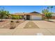 Single-story brick home with desert landscaping and an attached two-car garage at 3747 W Aire Libre Ave, Phoenix, AZ 85053
