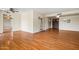Living room featuring wood floors and an updated ceiling fan at 3747 W Aire Libre Ave, Phoenix, AZ 85053