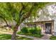 Charming condo featuring mature shade trees, verdant lawns, and a welcoming walkway at 3821 N 28Th St, Phoenix, AZ 85016