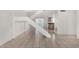 Bright living room with tiled floors, staircase, and view into adjacent kitchen at 3821 N 28Th St, Phoenix, AZ 85016