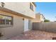 Back patio featuring red brick flooring, a security door, and access to a storage unit at 3821 N 28Th St, Phoenix, AZ 85016