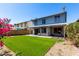 Exterior of the home showcasing the backyard and landscaping at 3829 W Camino Del Rio --, Glendale, AZ 85310