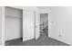 Bright bedroom featuring a closet and staircase access at 3829 W Camino Del Rio --, Glendale, AZ 85310