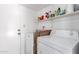 Functional laundry room with modern appliances and ample storage space at 3829 W Camino Del Rio --, Glendale, AZ 85310