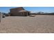 Large backyard covered in gravel, an open patio, and a gazebo at 4088 N 309Th Cir, Buckeye, AZ 85396
