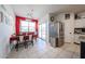 Inviting dining area with stainless steel appliances, ample cabinet space, and easy access to the outdoor area at 4088 N 309Th Cir, Buckeye, AZ 85396
