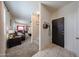 Warm entryway leads to the living area, showcasing tiled floors and convenient storage at 4088 N 309Th Cir, Buckeye, AZ 85396