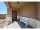 Inviting front porch with seating and a 'Welcome' sign, creating a cozy entrance at 4088 N 309Th Cir, Buckeye, AZ 85396