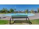 Active splash pad features a variety of playful water elements surrounded by greenery and seating at 4088 N 309Th Cir, Buckeye, AZ 85396