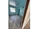 Bedroom featuring blue walls, a ceiling fan, natural light, and an open closet, awaiting customization at 4418 N 19Th Pl, Phoenix, AZ 85016