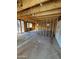 Unfinished room with framing and exposed beams, offering a glimpse into potential customization at 4418 N 19Th Pl, Phoenix, AZ 85016
