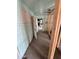 Interior view showcasing a room under renovation with exposed framing and an open doorway at 4418 N 19Th Pl, Phoenix, AZ 85016