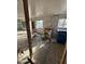 Interior shot of room under renovation featuring a stove, office chair, and ample natural light from the windows at 4418 N 19Th Pl, Phoenix, AZ 85016