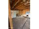 Interior view of a home, featuring exposed framing and unfinished walls, offering a fixer-upper opportunity at 4418 N 19Th Pl, Phoenix, AZ 85016