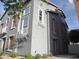 Two-story home featuring shuttered windows and small balconies at 5720 S 21St Ter, Phoenix, AZ 85040