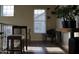 Open living space with modern furnishings, natural light, and sleek hardwood flooring at 5720 S 21St Ter, Phoenix, AZ 85040