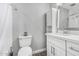 Clean bathroom features white vanity, modern fixtures, and a combined shower and toilet area at 591 N Cheri Lynn Dr, Chandler, AZ 85225