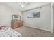 Cozy bedroom features a dresser, window and neutral colored walls at 591 N Cheri Lynn Dr, Chandler, AZ 85225