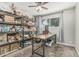 Versatile room with shelving, window, and a ceiling fan, ideal for storage at 591 N Cheri Lynn Dr, Chandler, AZ 85225