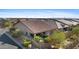Attractive single story home with covered patio and desert landscaping in backyard at 6948 E Quill St, Mesa, AZ 85207