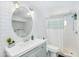 Bright bathroom featuring white subway tiles, modern fixtures, and a washer/dryer at 747 E Germann Rd # 15, San Tan Valley, AZ 85140