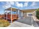 Welcoming single-story home offering a covered porch, beautiful landscaping, and a convenient carport for parking at 747 E Germann Rd # 15, San Tan Valley, AZ 85140