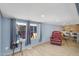 Comfortable living room with hardwood floors, ample natural light, and cozy seating, perfect for relaxing or entertaining guests at 747 E Germann Rd # 15, San Tan Valley, AZ 85140