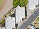 This aerial view captures orderly home rooftops, community street parking, and well-defined property lines at 7601 E Roosevelt St # 1012, Scottsdale, AZ 85257