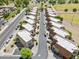 An aerial view showcases an orderly, well-maintained community with manicured landscaping and convenient street parking at 7601 E Roosevelt St # 1012, Scottsdale, AZ 85257