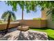 Backyard featuring cozy fire pit, lush landscaping and artificial turf at 7601 E Roosevelt St # 1012, Scottsdale, AZ 85257