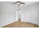 Bright bedroom features wood-look floors, closet and access to a bathroom at 7601 E Roosevelt St # 1012, Scottsdale, AZ 85257