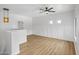 Cozy upstairs loft with board and batten accent wall, wood-look floors, and natural lighting at 7601 E Roosevelt St # 1012, Scottsdale, AZ 85257
