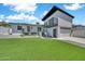 Spacious backyard with artificial turf, modern design, and an attached two car garage at 8436 N 13Th N Pl, Phoenix, AZ 85020
