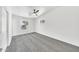 Bedroom with a window, ceiling fan, and carpet floor at 8436 N 13Th N Pl, Phoenix, AZ 85020