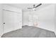 Bedroom with a ceiling fan, carpet, and closet at 8436 N 13Th N Pl, Phoenix, AZ 85020