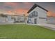 Beautiful two-story home with manicured lawn, and a second-story balcony at 8436 N 13Th N Pl, Phoenix, AZ 85020